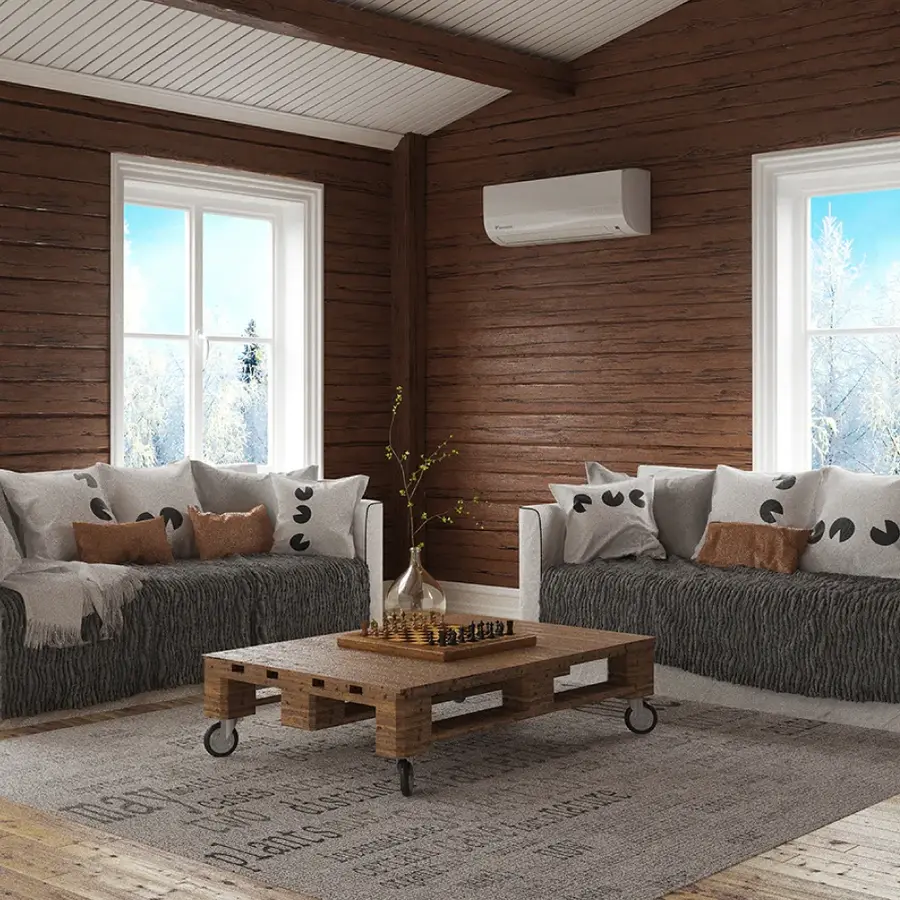 Daikin Moskus on the wall of a wood-panelled cabin living room
