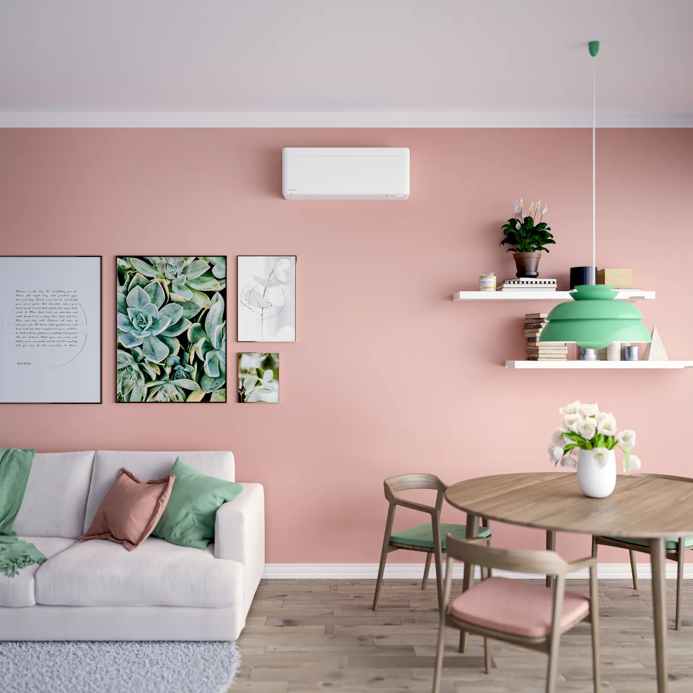 Daikin Stylish i matt hvit i et lyst rom med en innrammet bildevegg